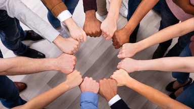 Multicultural hands in a circle